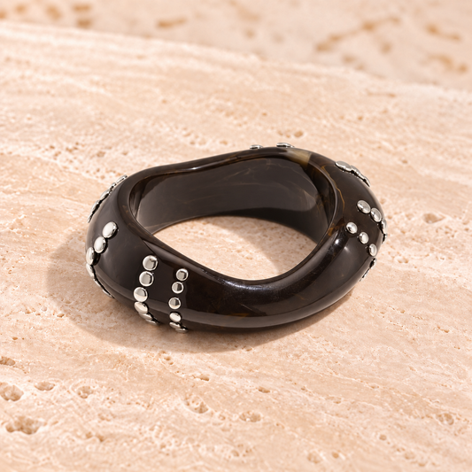 Marbelune bangle bracelet with studs in a striped pattern